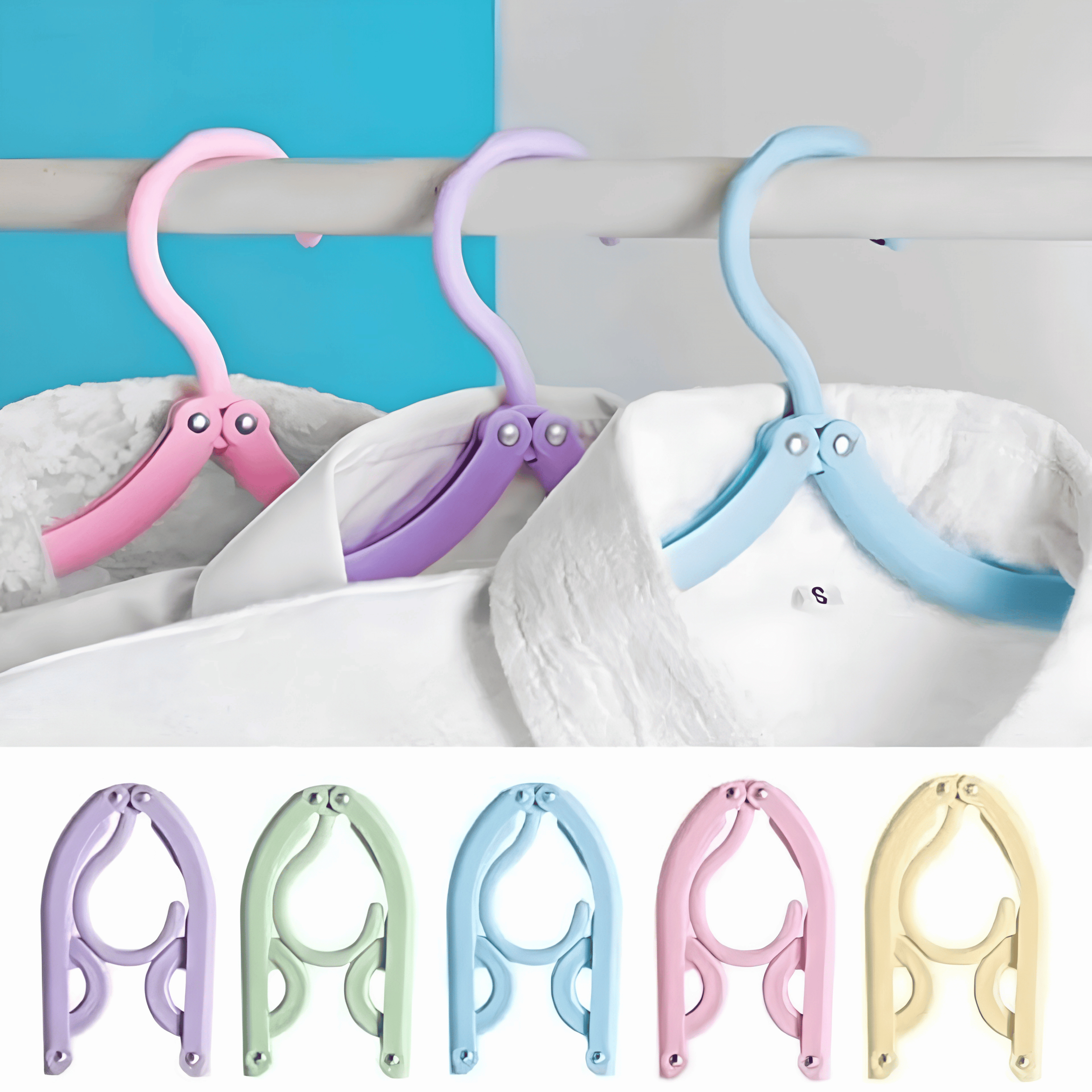 White shirts on opened pink, purple and blue travel hangers