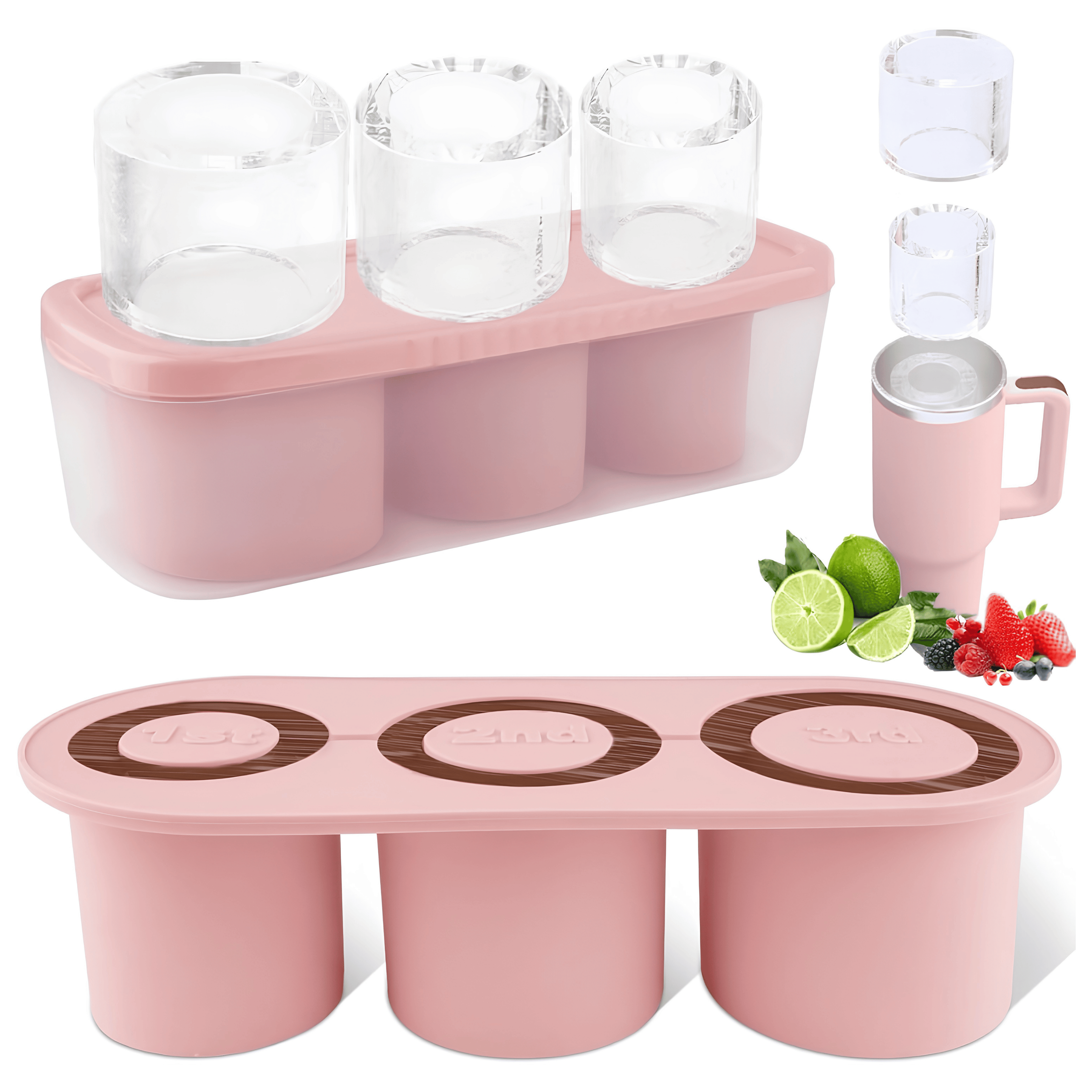 Pink silicone ice cube tray with three clear cylinder ice cubes and a tumbler