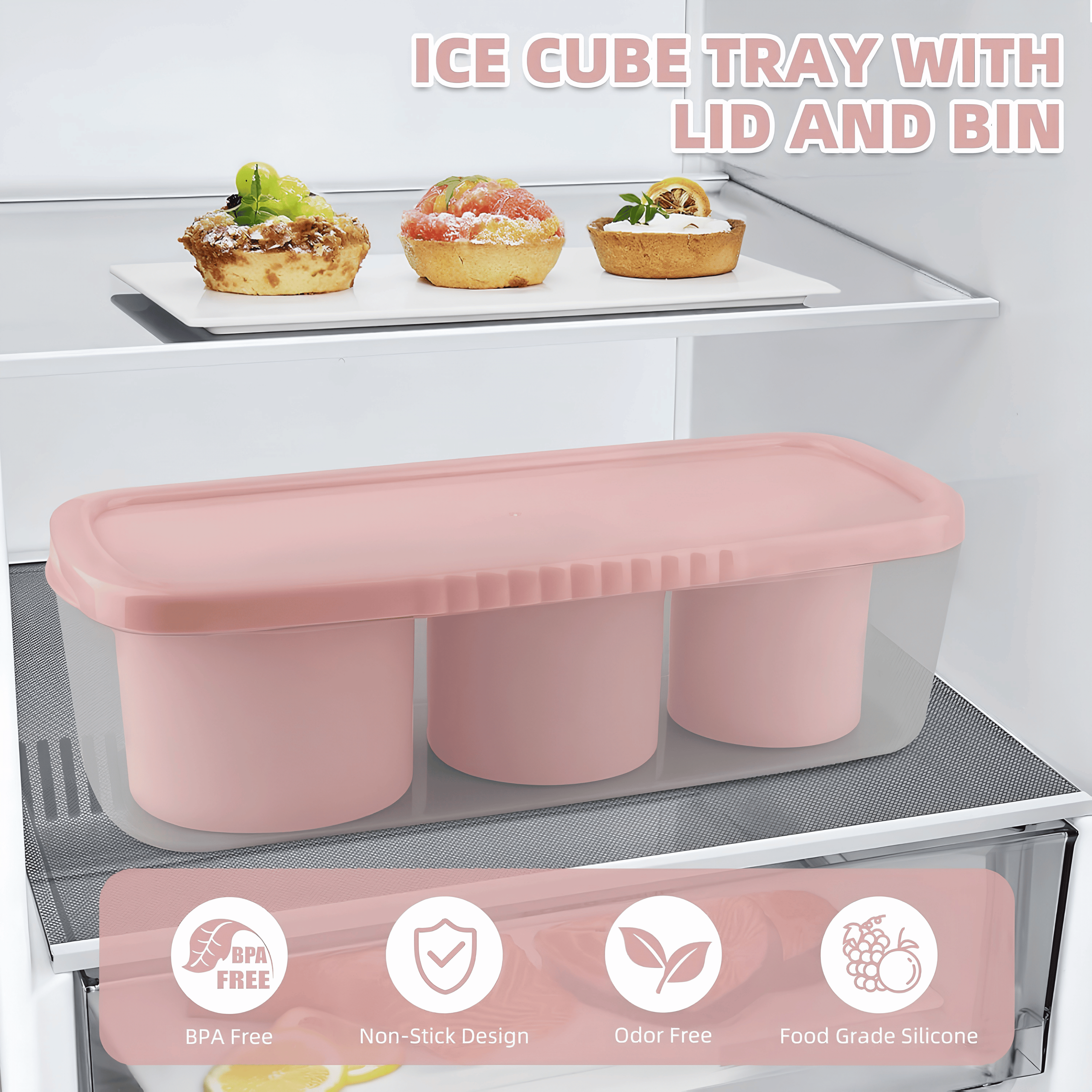 Pink silicone ice cube tray with lid and storage bin in a fridge