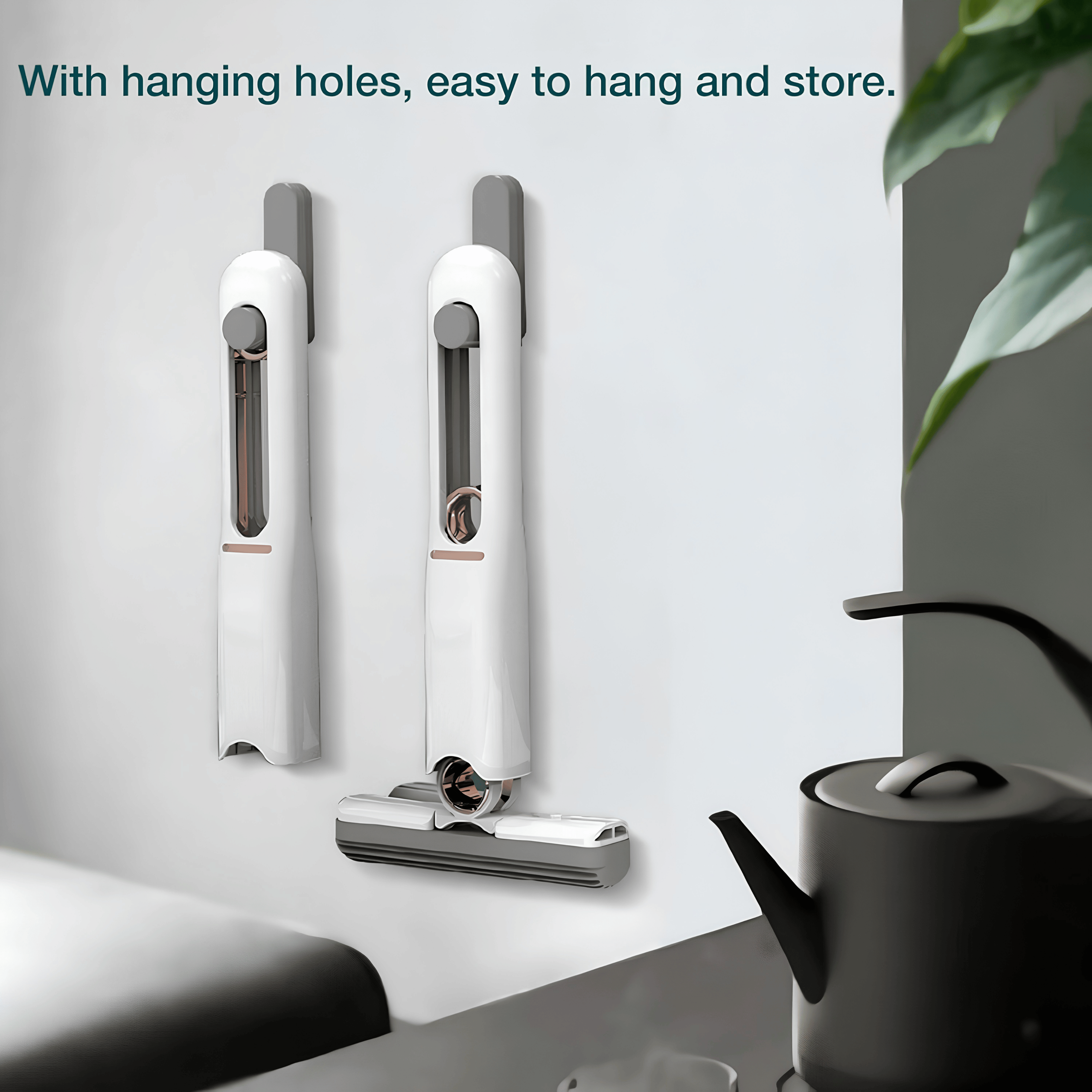 White mini mop hanging on a wall for easy storage