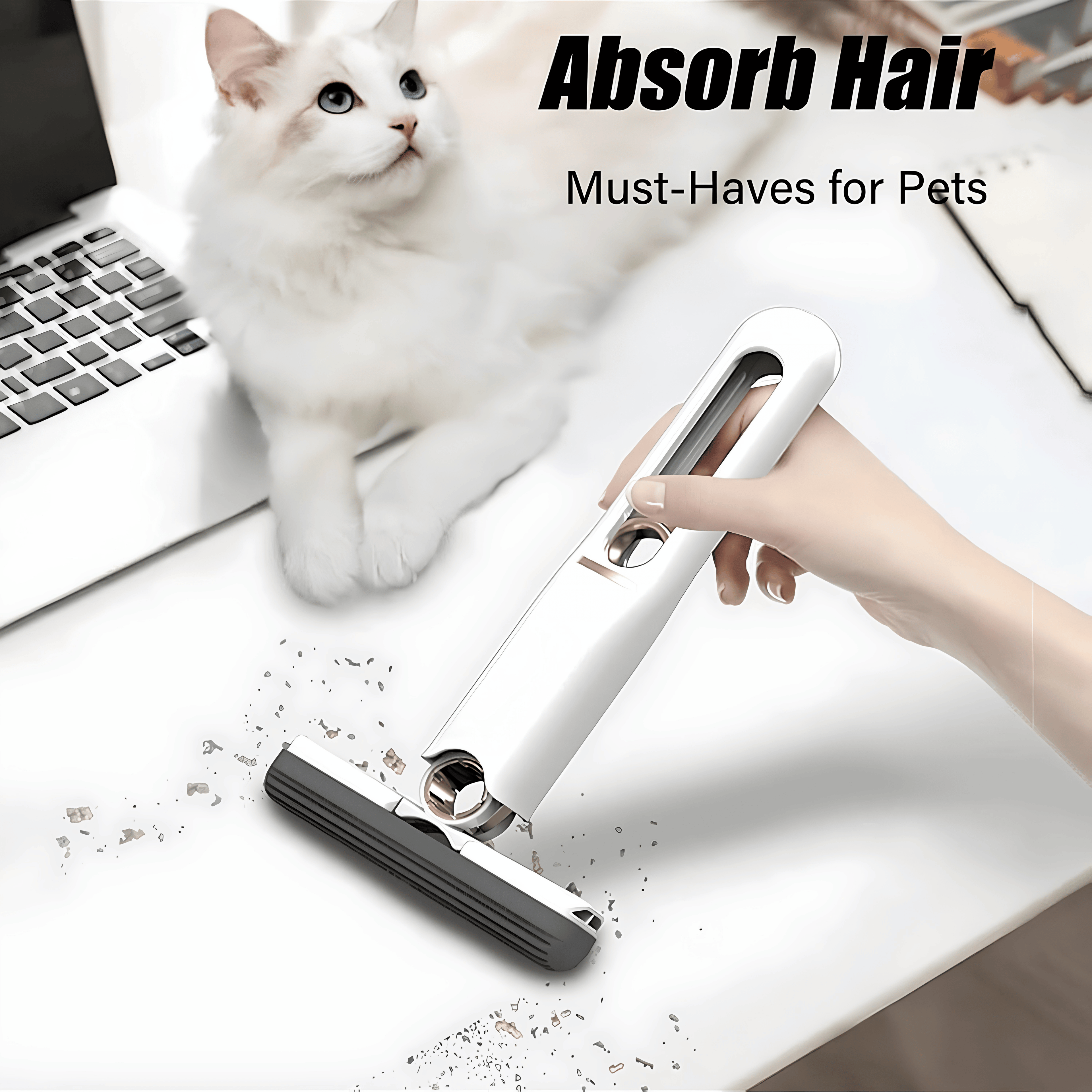 White mini mop cleaning dust and hair off a desk